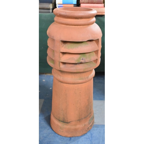 595 - A Terracotta Chimney Pot, 82cm high