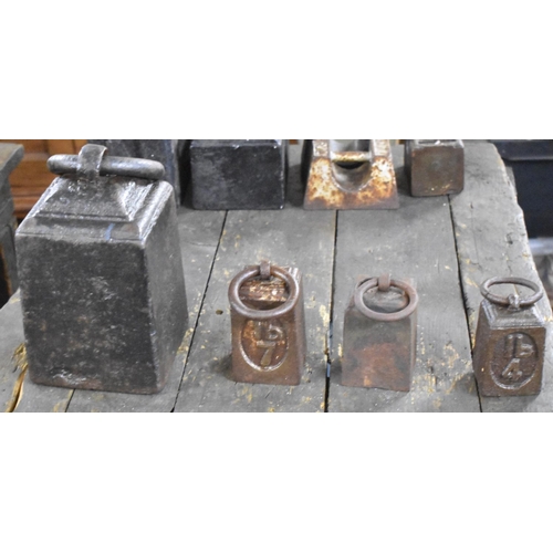 609 - A Collection of Four Cast Iron Vegetable Scale weights