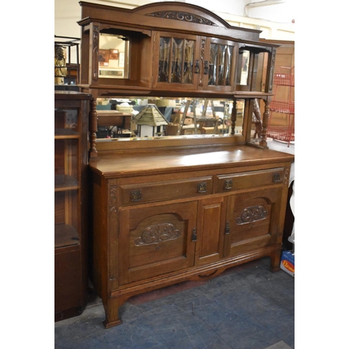 636 - An Arts and Crafts Influenced Mirror Backed Sideboard, The Base with Two Long Drawers Over Cupboards... 