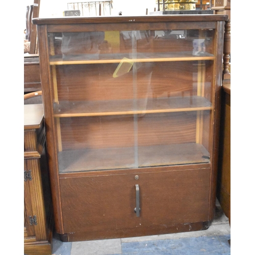 639 - A Mid 20th Century Glazed Bookcase with Cupboard Base, 104cm wide