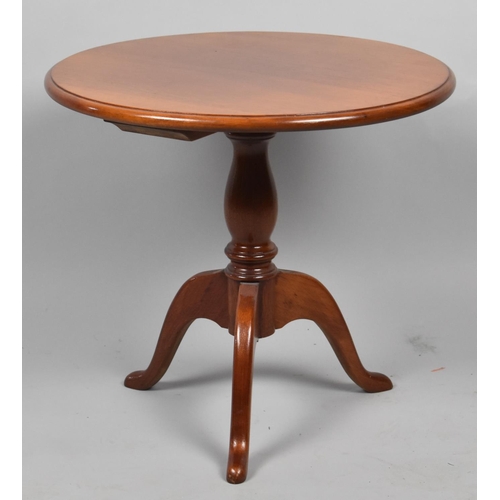 640 - A Small Circular Mahogany Tripod Table, Retailed by Rushworths, 50cm diameter