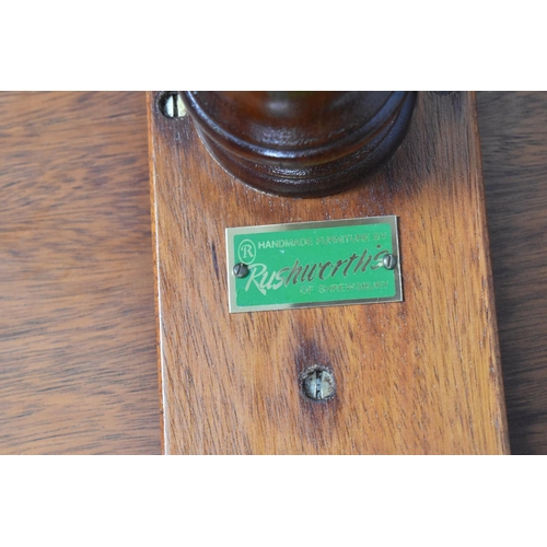 640 - A Small Circular Mahogany Tripod Table, Retailed by Rushworths, 50cm diameter