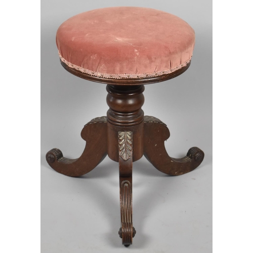 647 - A Late 19th Century Swivel Topped Adjustable Piano Stool on Scrolled Tripod Supports, 35cm Diameter