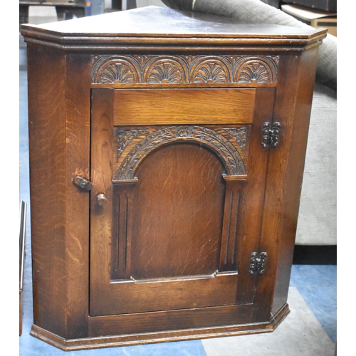 648 - A Small Oak Corner Cabinet, 61cm wide