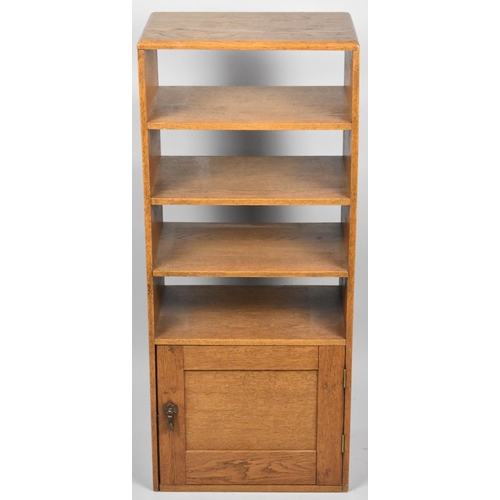 660 - A Small Oak Shelved Unit with Cupboard Base, 38cm wide