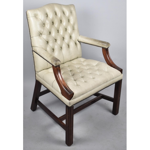 679 - A Mid 20th Century Mahogany Framed Buttoned Upholstered and Studded Armchair