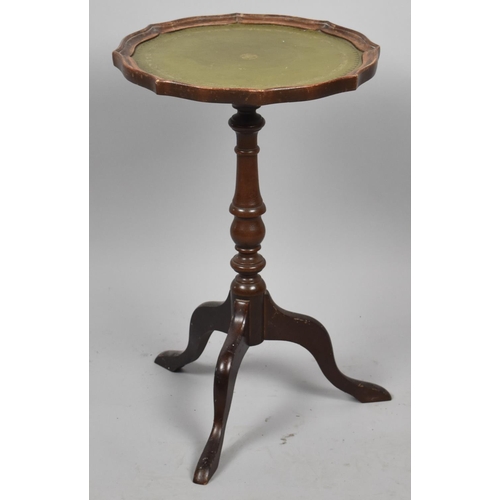 685 - A Small Leather Topped Tripod Wine Table, 33cm diameter