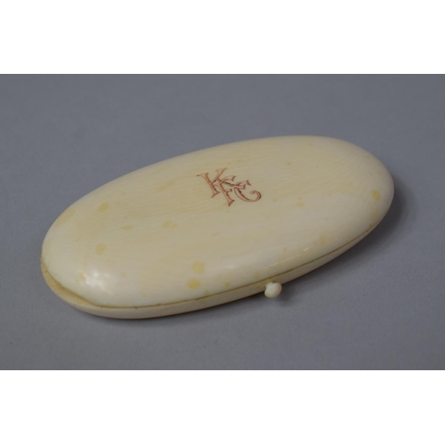 76 - A Late 19th Century Ivory Cased French Necessaire with Silver Gilt Scissors, Thimble, Needle Case et... 