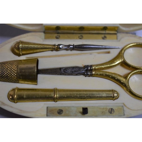 76 - A Late 19th Century Ivory Cased French Necessaire with Silver Gilt Scissors, Thimble, Needle Case et... 