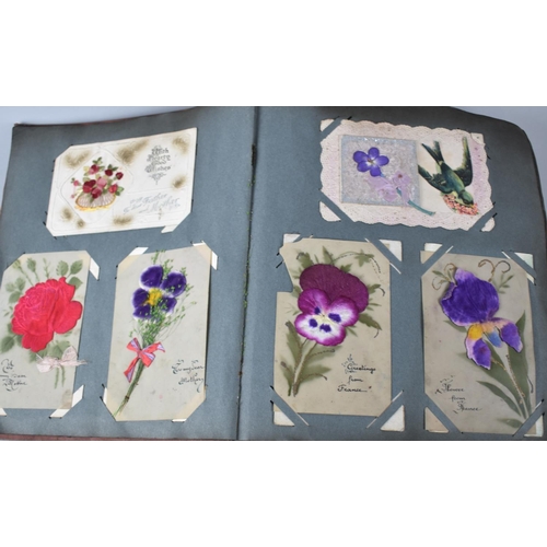 62 - An Early 20th Century Postcard Album Containing 32 WWI Silk Embroidered Examples Together with a Few... 