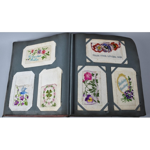 62 - An Early 20th Century Postcard Album Containing 32 WWI Silk Embroidered Examples Together with a Few... 