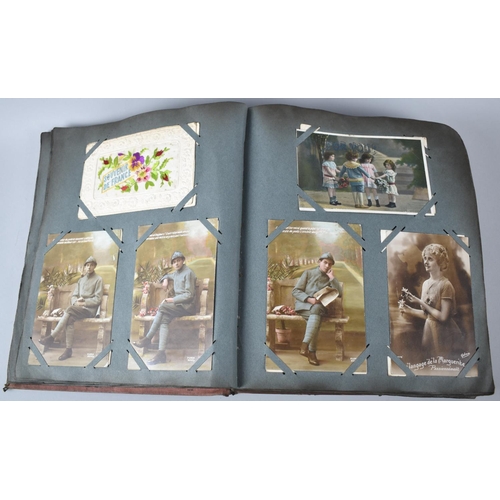 62 - An Early 20th Century Postcard Album Containing 32 WWI Silk Embroidered Examples Together with a Few... 