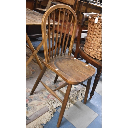 642 - A Single Spindle Back Chair