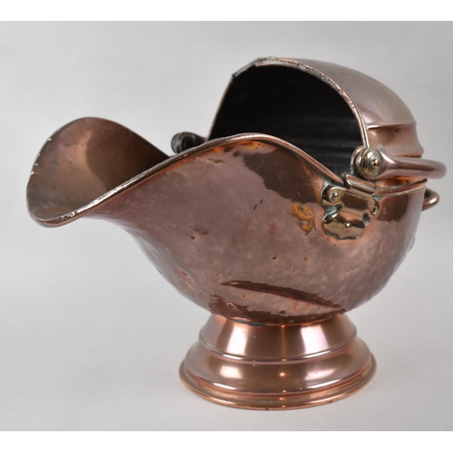 103 - A Late Victorian Copper Helmet Shaped Coal Scuttle with Loop Handle, 45cm Long