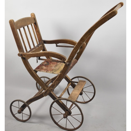 106 - A Late Victorian/Edwardian Folding and Reversible Child's Pushchair