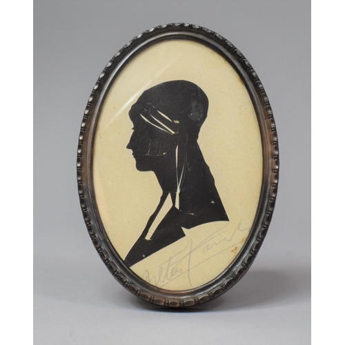 110 - An Oval Framed Silhouette Miniature Depicting Art Deco Maiden, Signed in Pencil, 14cm high