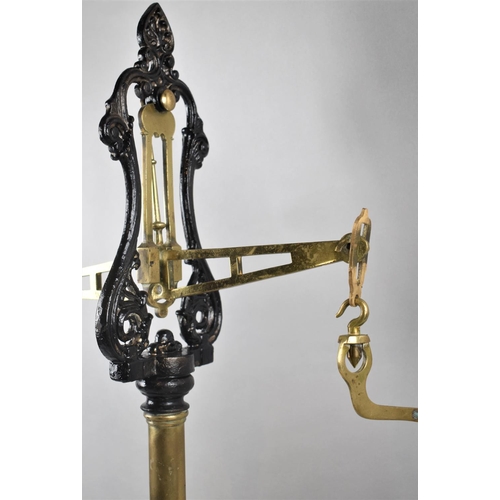 118 - A Late Victorian Brass and Cast Iron Set of Pan Scales, 71cm High