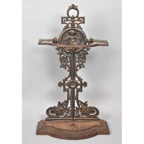 119 - A Reproduction Cast Iron Stick Stand with Removable Base Tray and Decorated with Seated Cherub, 75cm... 