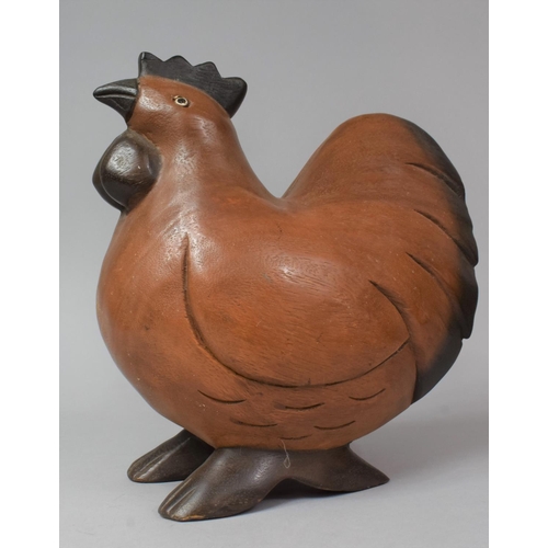 129 - A Carved Wooden Study of a Cockerel, 25cm High