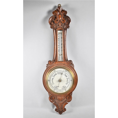 131 - A Late Victorian Carved Oak Aneroid Wheel Barometer with Thermometer, Cracked Glass, 91cm high