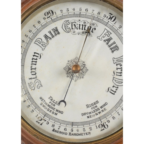 131 - A Late Victorian Carved Oak Aneroid Wheel Barometer with Thermometer, Cracked Glass, 91cm high