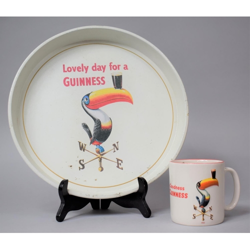 158 - A Reproduction Guinness Mug and a Circular Tray, 30cm Diameter