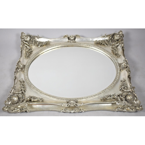 220 - A Modern Ornate Silver Framed Wall Mirror of Rectangular Form but with Oval Glass, 105x84cm