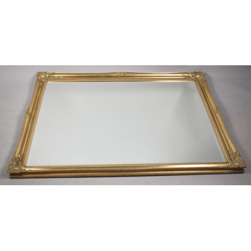 221 - A Large Modern Gilt Framed Rectangular Wall Mirror with Bevelled Glass, 132x105cm