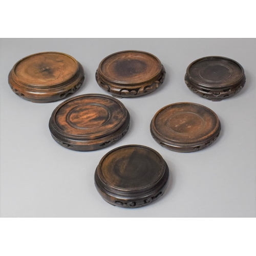 255 - A Collection of Six Various 20th Century Oriental Hard Wood Stands with Pierced Decoration, Some Con... 