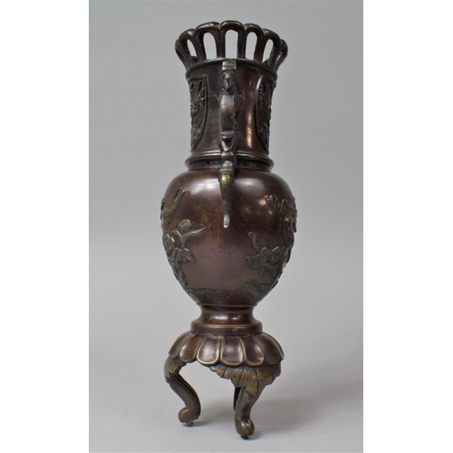 279 - An Oriental Bronze Urn Shaped Vase with Twin Dragon Handles, Decorated in Relief with Birds etc 28cm... 