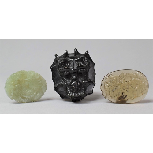 284 - Three Pieces of Jade type Items to Include Dragon Head Buckle and Two Carved Pendants