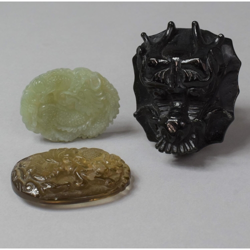 284 - Three Pieces of Jade type Items to Include Dragon Head Buckle and Two Carved Pendants