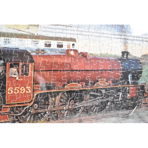 320 - A Framed Complete Jigsaw Puzzle of LMS Locomotive 