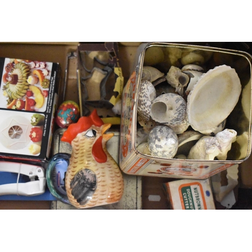 577 - A Box Containing Vintage Kitchenwares, Sea Shells, Food Cutter, Chicken Jug etc