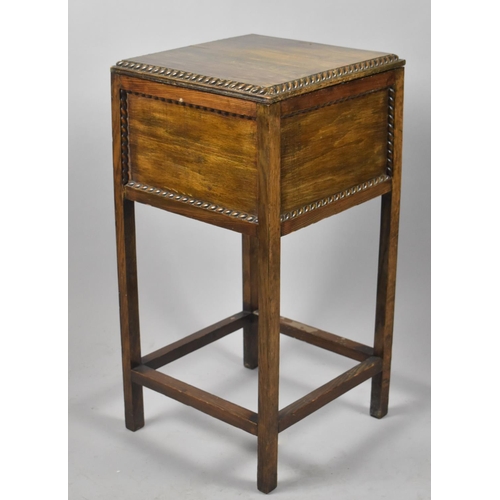 74 - An Edwardian Oak Sewing Box on Stand with Hinged Lid and Gadrooned Decoration, 33cm wide