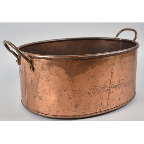 79 - An Oval Copper Two Handled Cooking Pot, 38cm wide