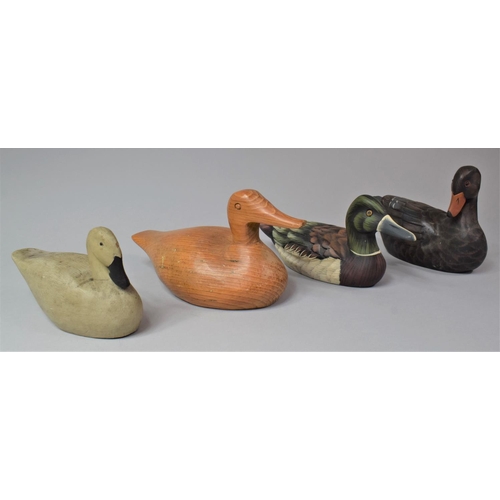 96 - A Collection of Four Wooden Modern Decoy Duck Style Ornaments