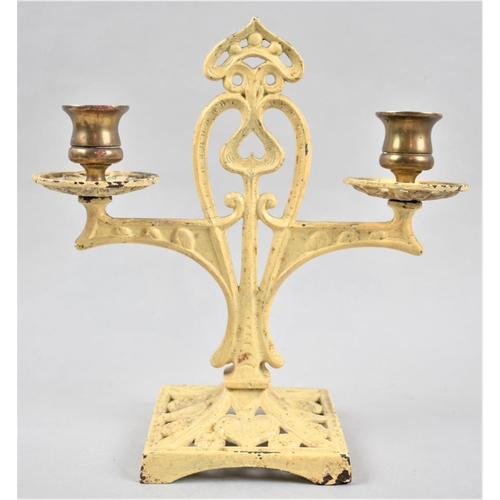 13 - A Cast Metal and Brass Two Branch Art Nouveau Candelabra, 23cm High