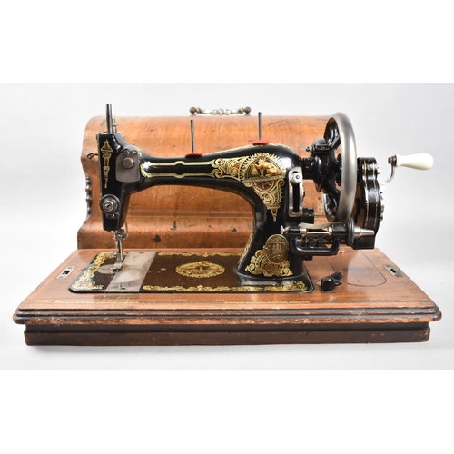 222 - A Vintage Cased Sewing Machine