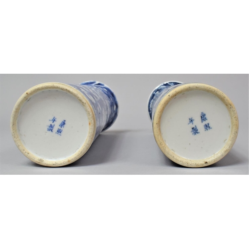 255 - A Near Pair of 19th Century Chinese Blue and White Prunus Pattern Sleeve Vases, both with Four Chara... 