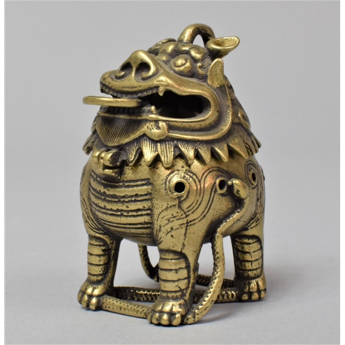 260 - A Chinese Bronze Incense Burner in the Form of a Temple Lion Standing Upon Serpent, 5.5cm high