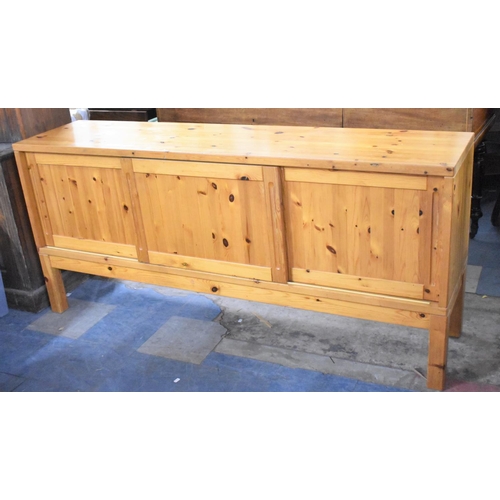 642 - A Modern Pine Sideboard, with Sliding Doors to Shelved Interior, 177cm wide