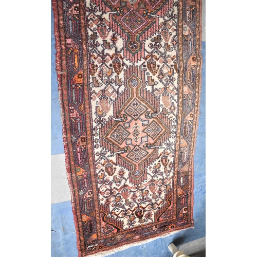 649 - A Patterned Woollen Runner, 230x58cm