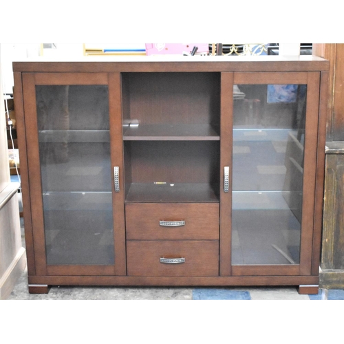 651 - A Modern Glazed Cabinet with Open Storage Space Over Two Short Drawer Flanked by Glazed Door to Shel... 