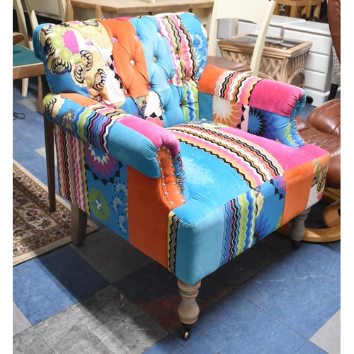 678 - A Buttoned Upholstered Arm Chair