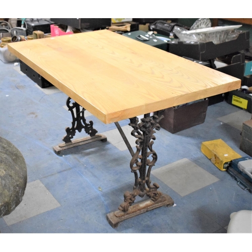 682 - A Modern Rectangular Wooden Topped Wrought Iron Based Table, 120x70cm