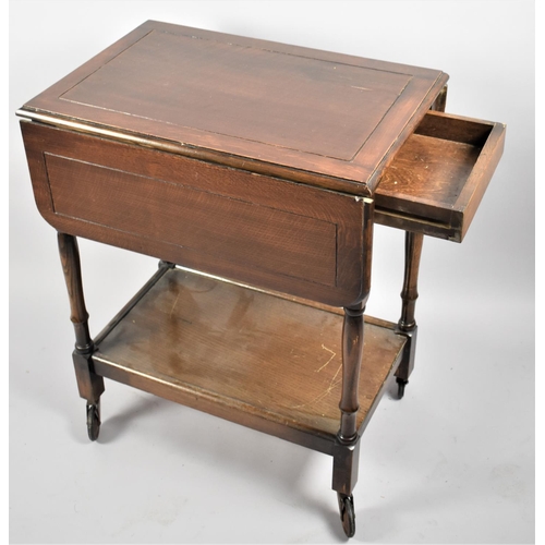 128 - An Edwardian Oak Drop Leaf Trolley, with Stretcher Shelf and End Drawer, 61cm Long