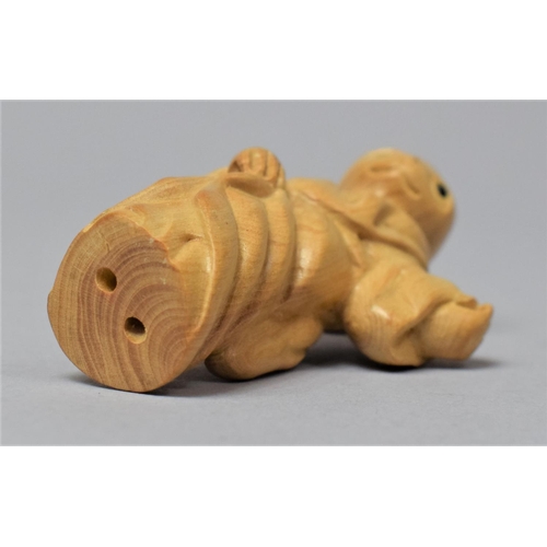 257 - A Carved Netsuke in the Form of an Anthropomorphic Standing Cat Wearing kimono Robe