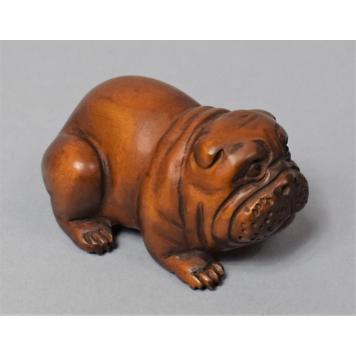 258 - A Nicely Carved Netsuke in the Form of a Bulldog, Signed, 5cm Long