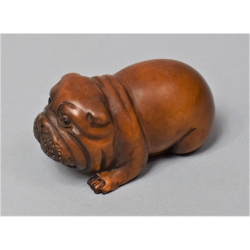 258 - A Nicely Carved Netsuke in the Form of a Bulldog, Signed, 5cm Long